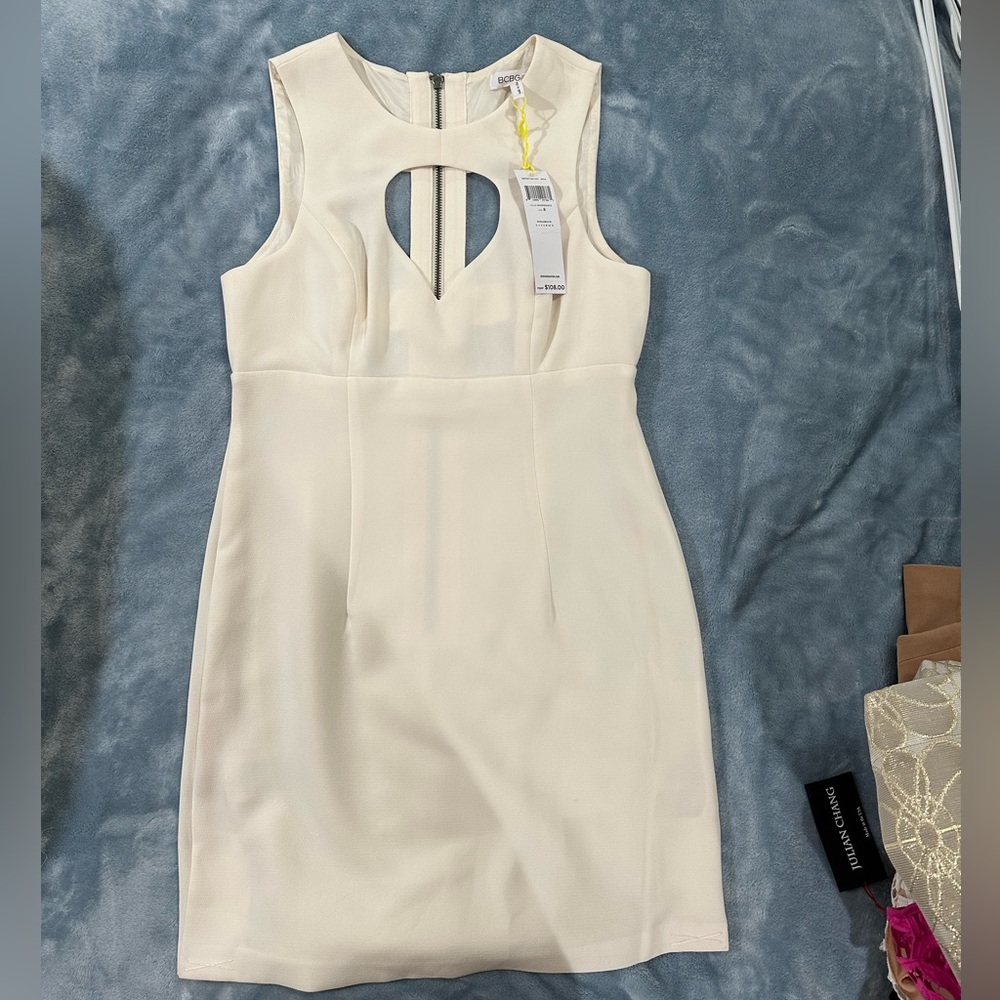 BCBG white size 8 dress. Never worn with tags. Gorgeous!